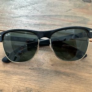 Black and gold ray bans